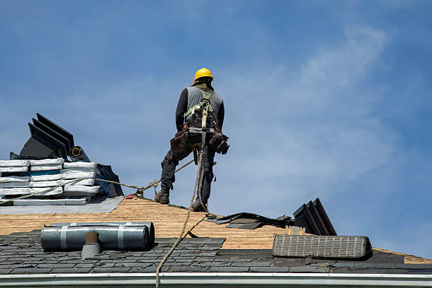 Professional Roof Replacement technician working in Tow, TX